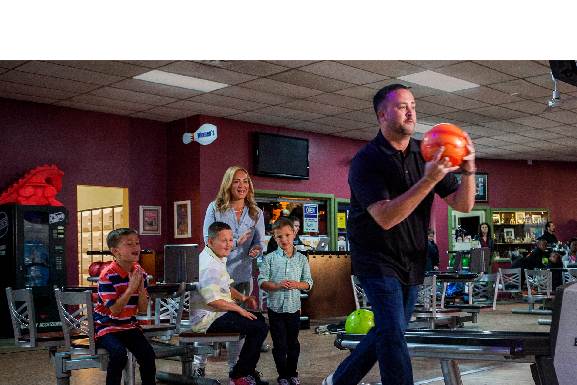 Parents and kids bowling